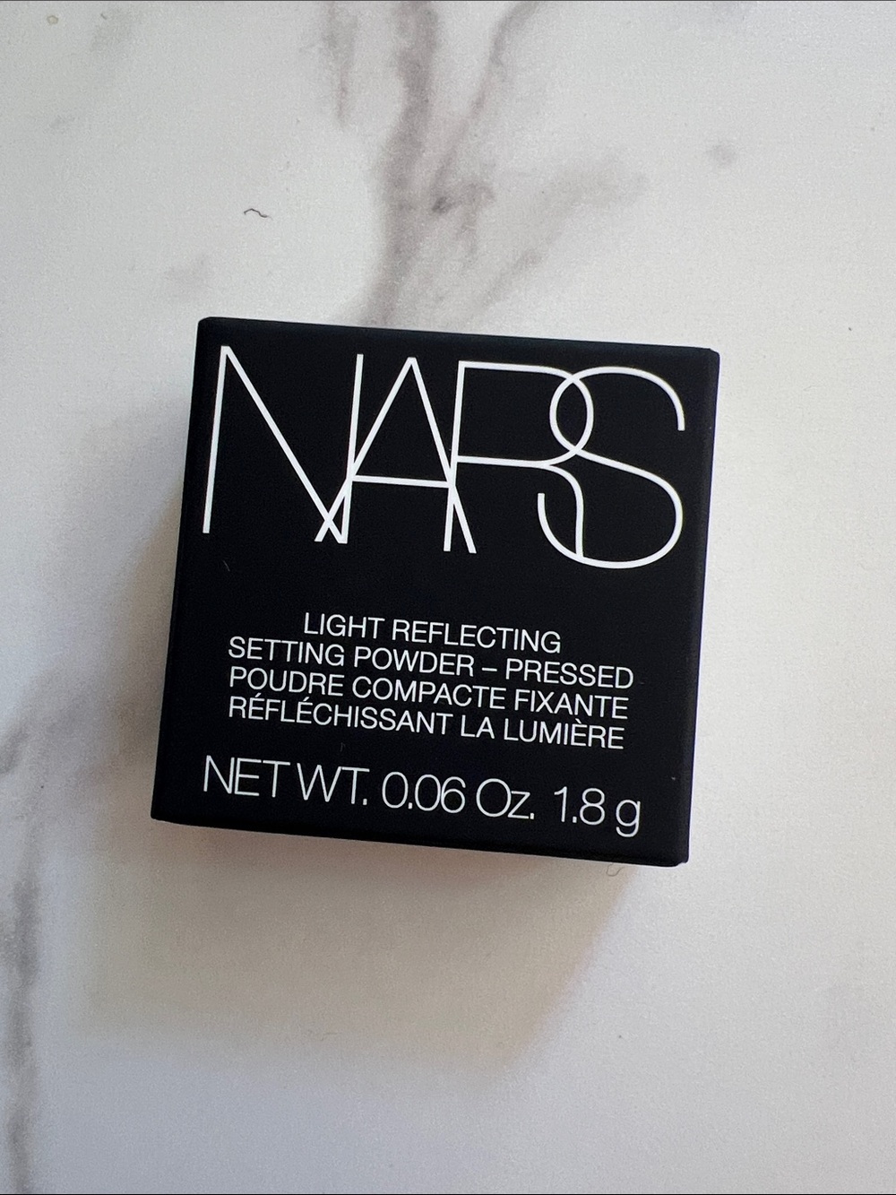 NARS Light Reflecting Pressed Setting Powder — Black Compact
